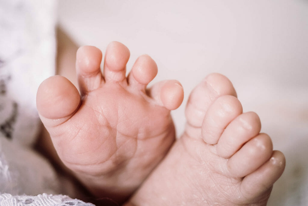 baby toes tickled